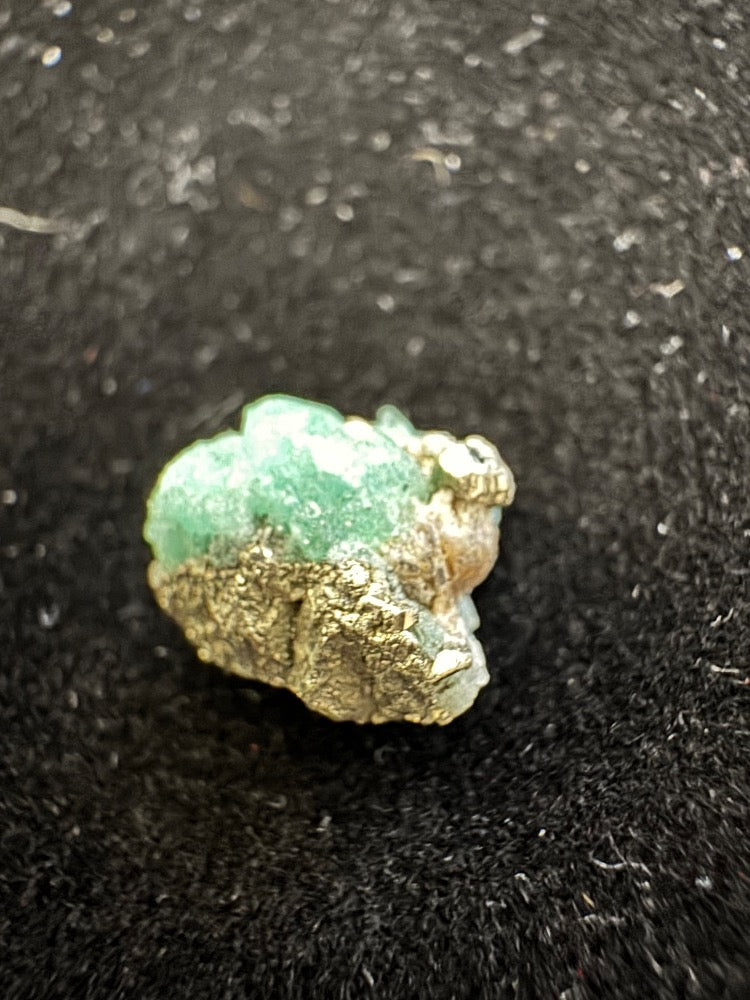 raw colombian emerald specimen