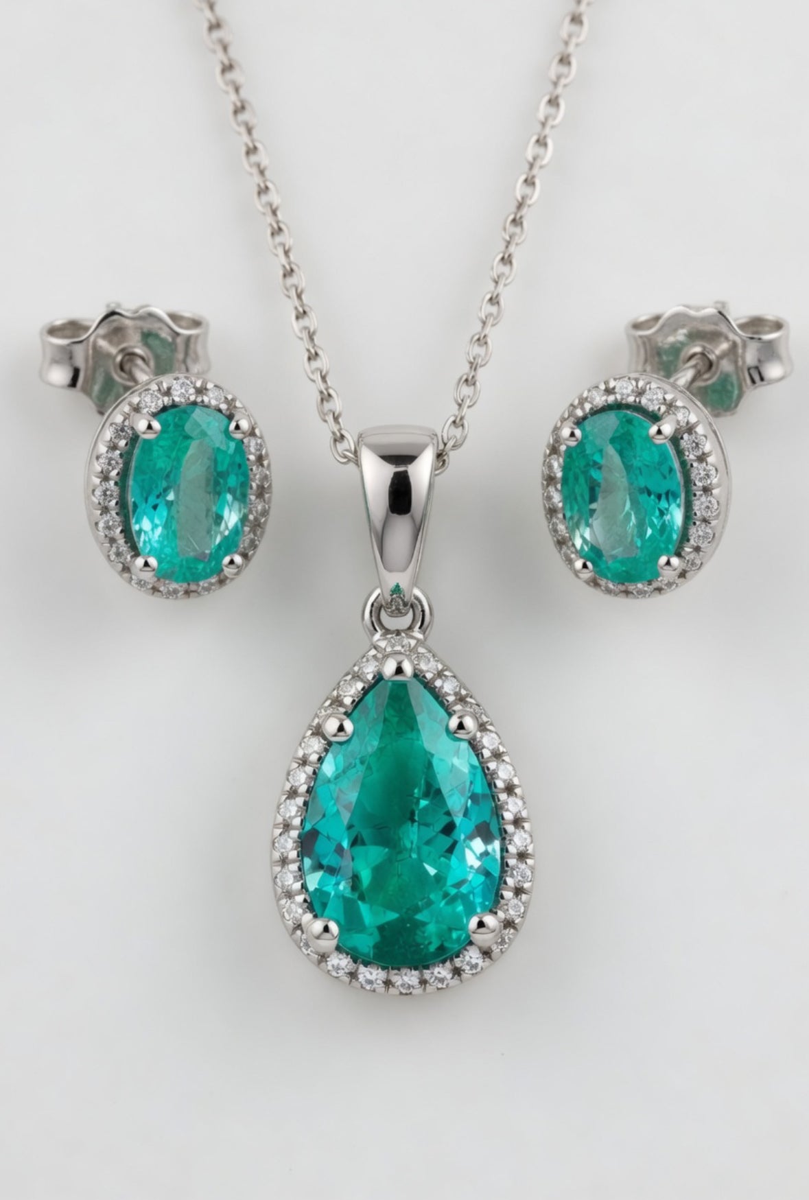Colombian emerald custom earring and pendant set